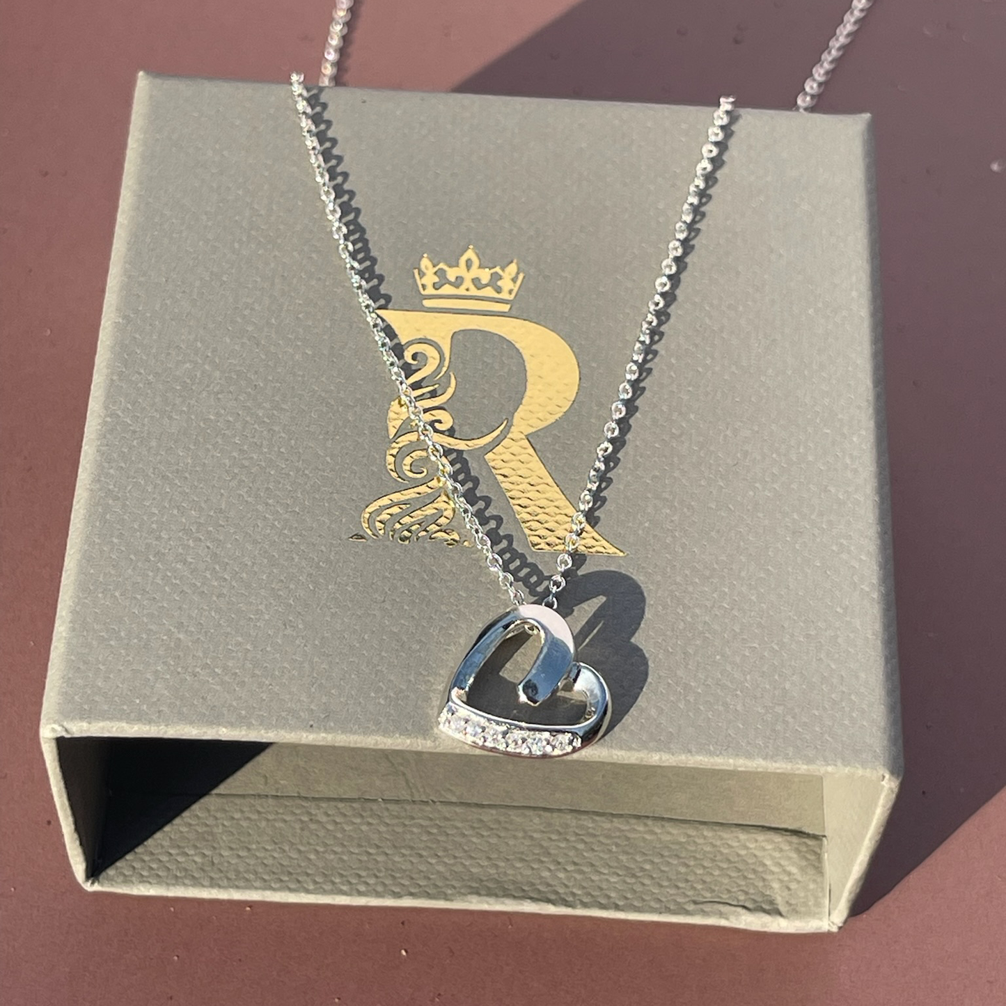 Rae's Silver Heart-Shaped CZ Pendant